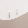 Dainty Cross Stud Earrings - Image 2